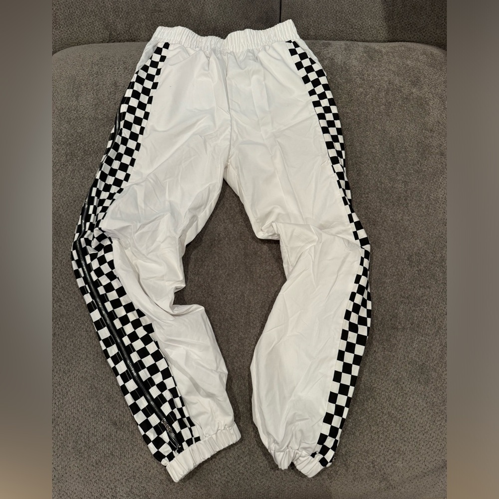 White pants with checkered detailing